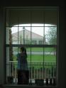 Shannon enjoyed the rain from the front porch.