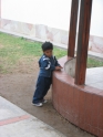 This boy was standing around outside the church while we were trying to find a way in