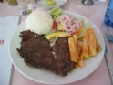 Lunch time!  Steak and fries isn't especially Peruvian, but pairing it with rice and the advocado-onion-tomato salad helped.