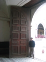Gustavo with the door to show that it's HUGE!