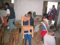 Moving the chairs into the room where we stay for movie time (I think this is one of the only pictures I have of the room where we stayed)